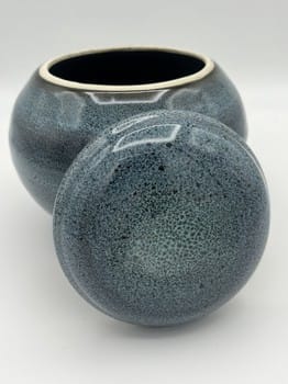 Mike Teal pottery, blue oil spot container, handmade ceramics, porcelain lidded jar, wheel-thrown pottery, artisan stoneware, Tulsa ceramic artist, functional pottery, small ceramic jar, YENology artisan collection