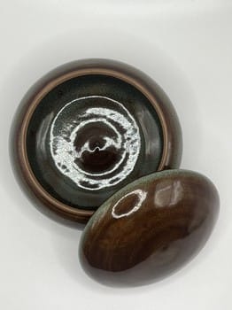 light green swirl container, brown ceramic lidded jar, small ceramic container, Mike Teal pottery, hand thrown lidded vessel, stoneware container, Cone 6 pottery