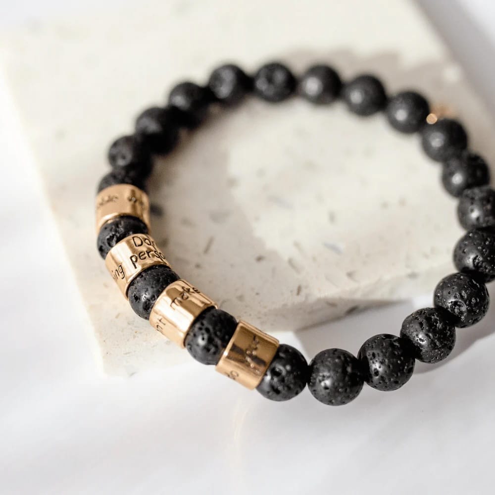 Four Agreements bracelet, black lava bracelet, grounding jewelry, Jewelry Evolution, don Miguel Ruiz bracelet, Toltec wisdom jewelry, lava rock beads, unisex gemstone bracelet, mindfulness jewelry, YENology accessories