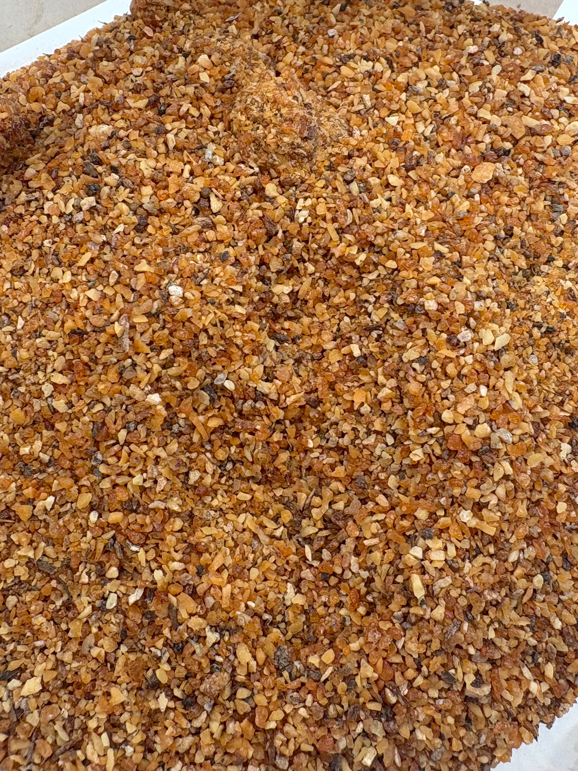 Finely powdered Benzoin resin from Sumatra in a 1 oz package by YENology®, showcasing its rich, natural color and texture—used for incense, relaxation, and meditation rituals.