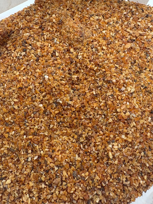 Finely powdered Benzoin resin from Sumatra in a 1 oz package by YENology®, showcasing its rich, natural color and texture—used for incense, relaxation, and meditation rituals.