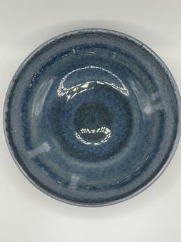 Blue and green drip bowl
Mike Teal ceramic bowl
Hand-thrown stoneware dish