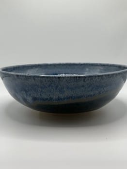 Cone 6 artisan pottery
Light blue glaze drips
6.5 inch ceramic bowl