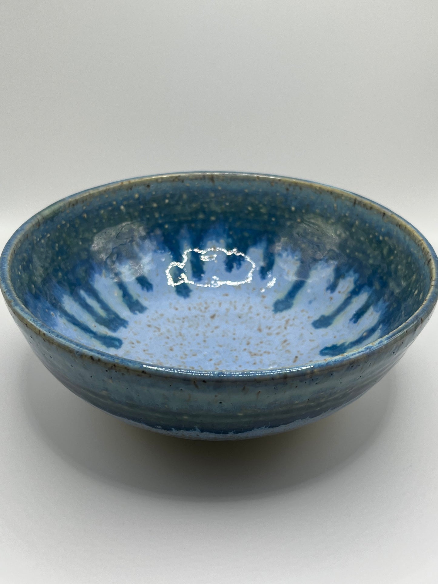 Drip blue speckled bowl
Mike Teal ceramic bowl
Hand-thrown clay dish