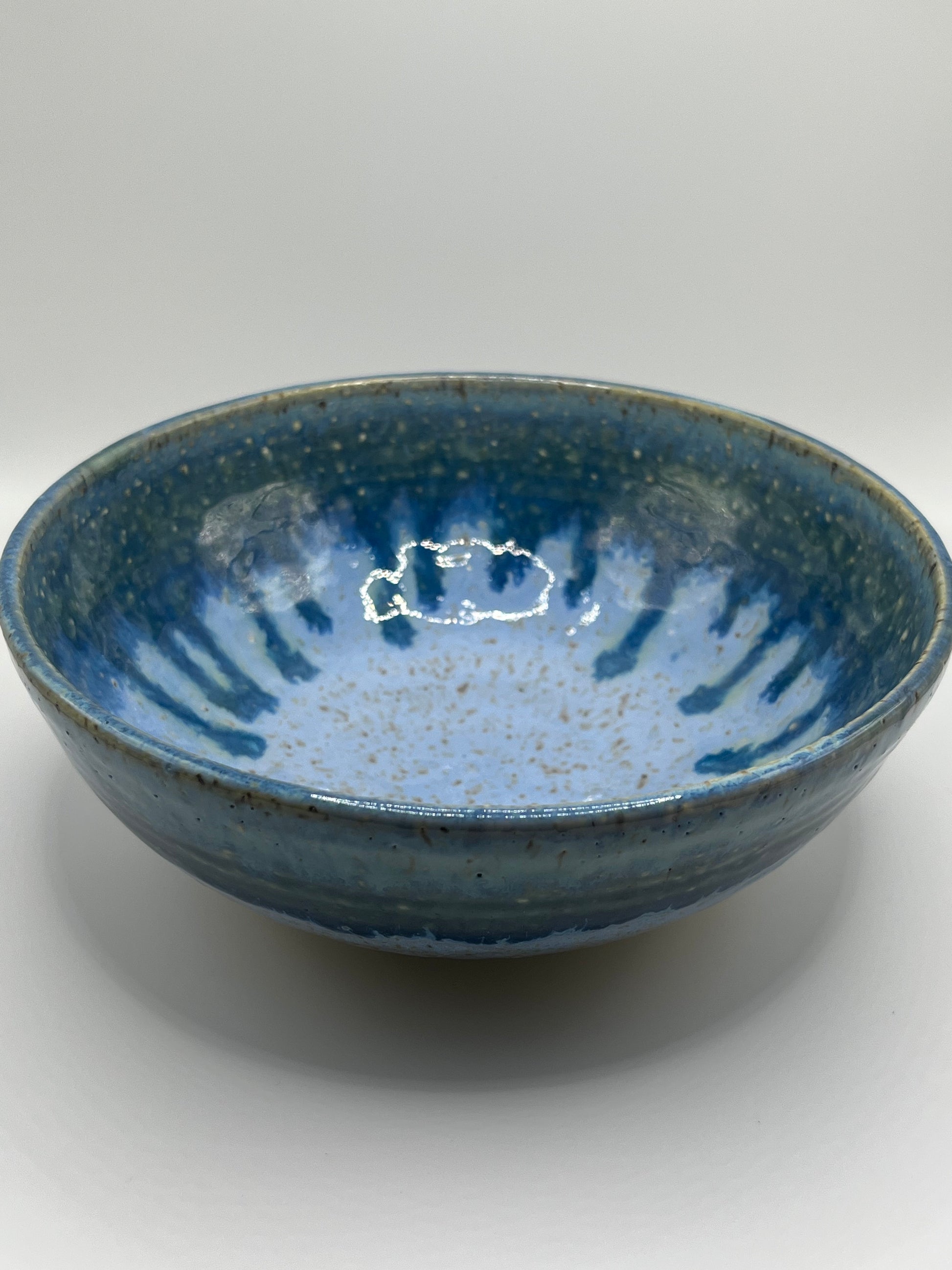 Drip blue speckled bowl
Mike Teal ceramic bowl
Hand-thrown clay dish