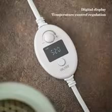 White electronic device with digital display on a brown textured background