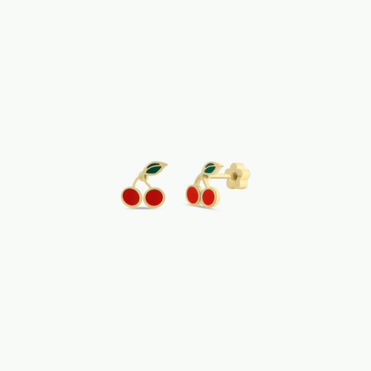 Cherry-themed gold earrings on a white background