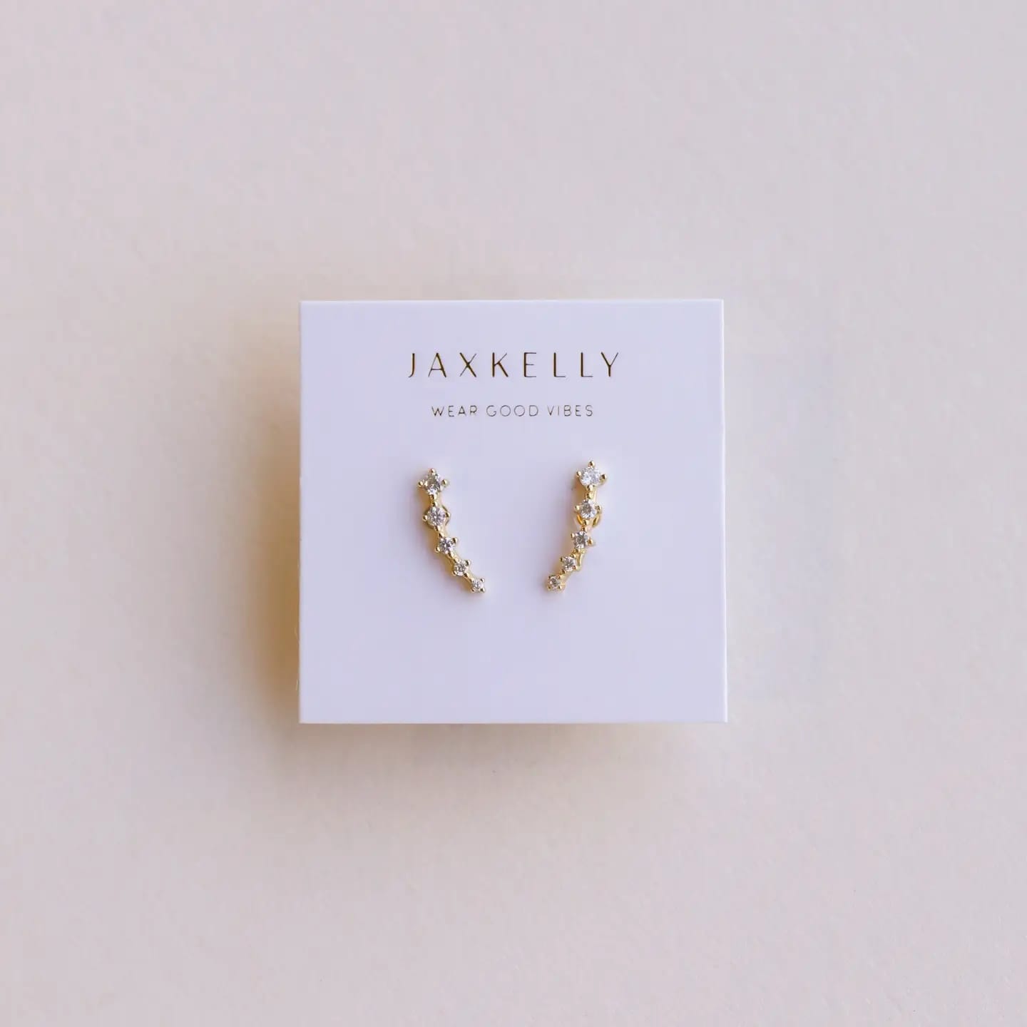 white CZ ear crawlers, gold ear crawler earrings, CZ curved earrings, hypoallergenic gold earrings, sterling silver CZ earrings, minimalist crawler earrings, dainty gold crawlers