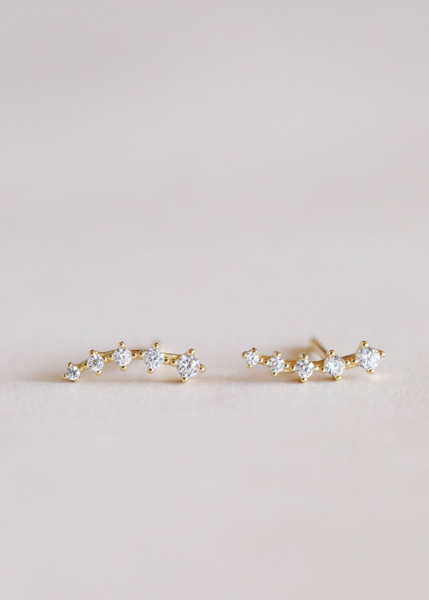 white CZ ear crawlers, gold ear crawler earrings, CZ curved earrings, hypoallergenic gold earrings, sterling silver CZ earrings, minimalist crawler earrings, dainty gold crawlers