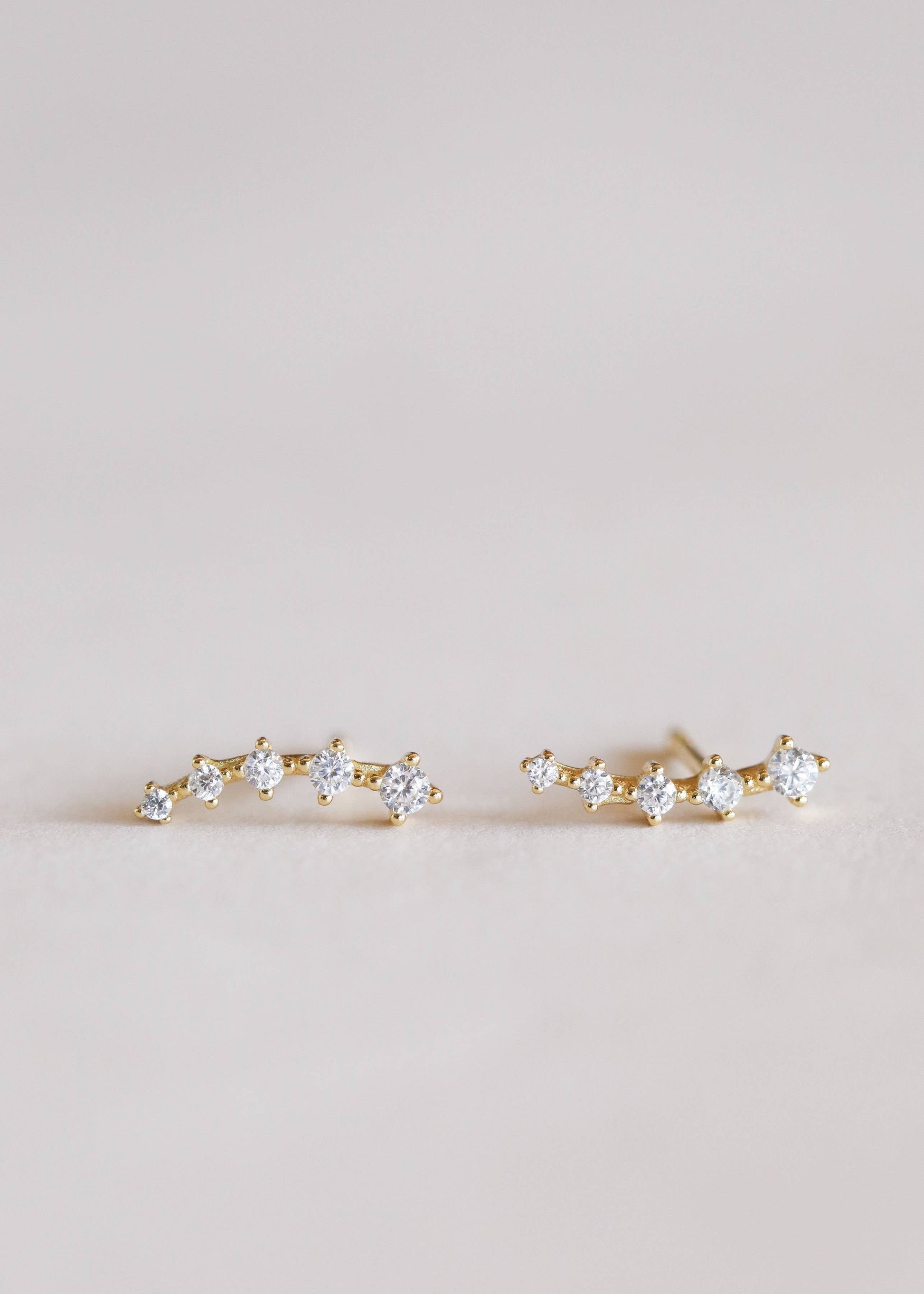 white CZ ear crawlers, gold ear crawler earrings, CZ curved earrings, hypoallergenic gold earrings, sterling silver CZ earrings, minimalist crawler earrings, dainty gold crawlers