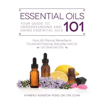 Cover of Essential Oils 101: Your Guide to Understanding showing essential oils and botanicals.
