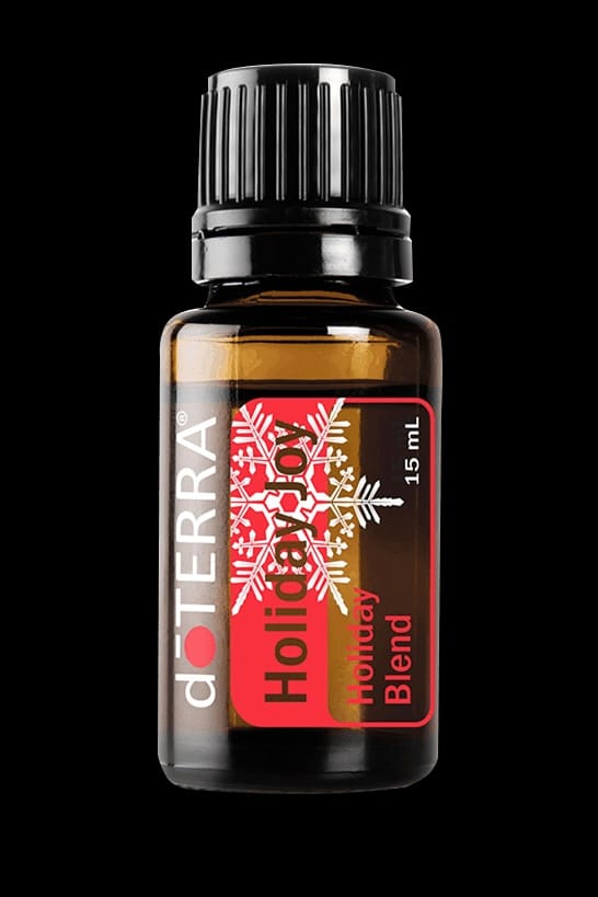 doTERRA holiday joy, holiday essential oil blend, festive diffuser oil, Christmas aroma oil, clove and orange oil, holiday air freshener, warm spicy essential oil, winter scent oil, seasonal aromatherapy blend, uplifting essential oil
