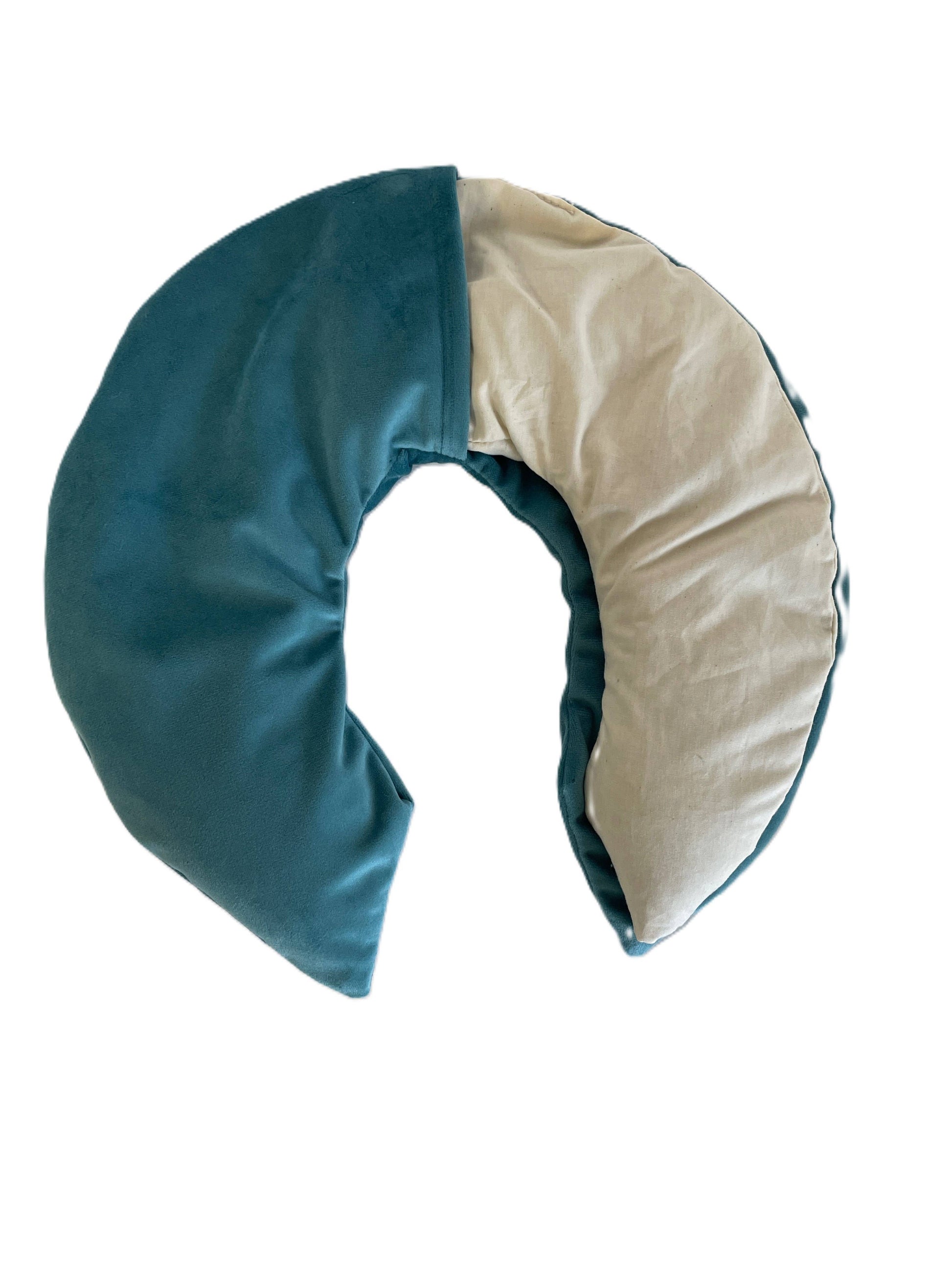 Blue and beige neck pillow on a white background