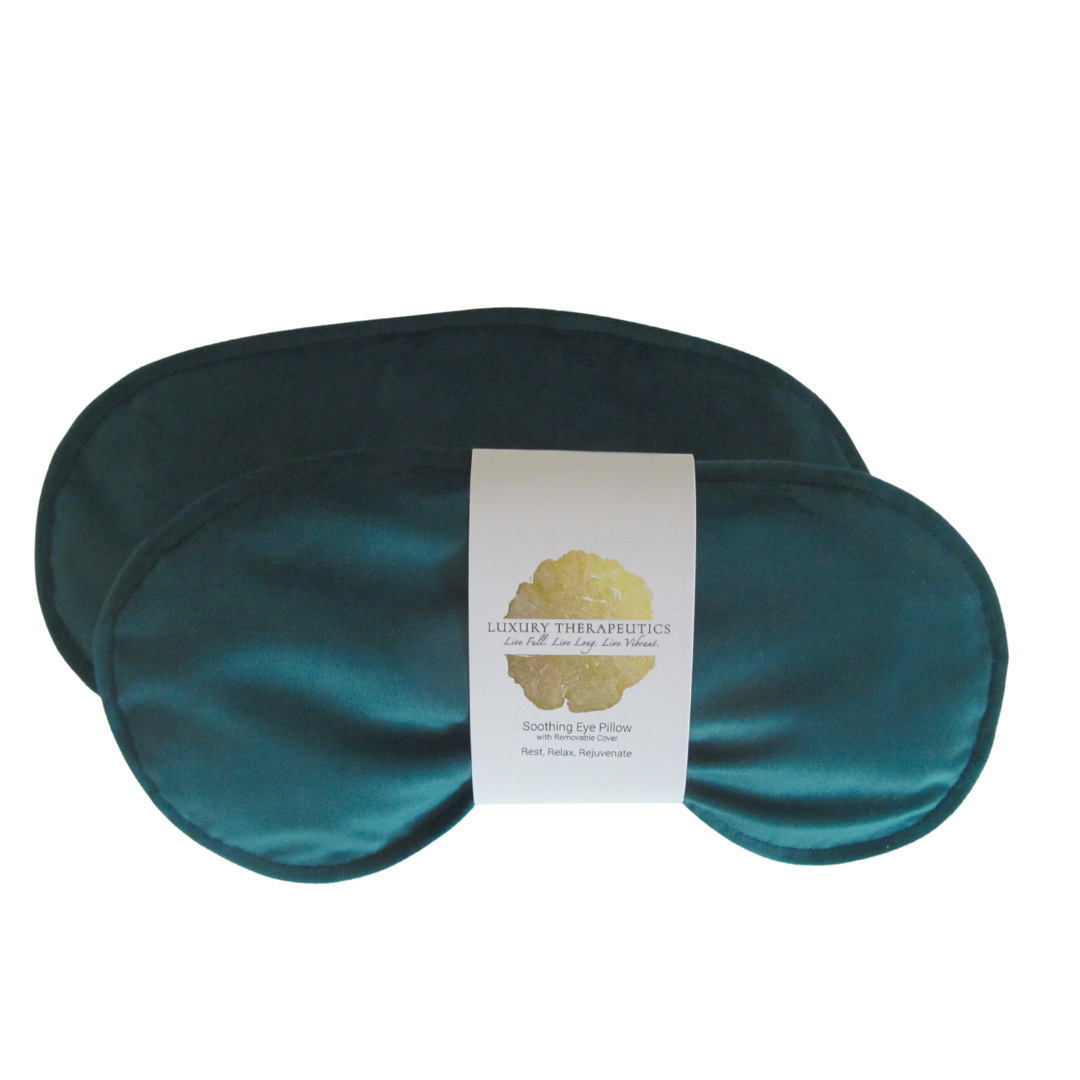 Close-up of teal velvet cover showing luxurious texture.