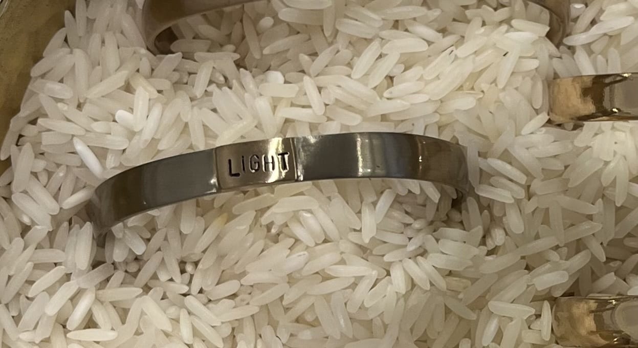 Silver bracelet with engraved with "Light"
