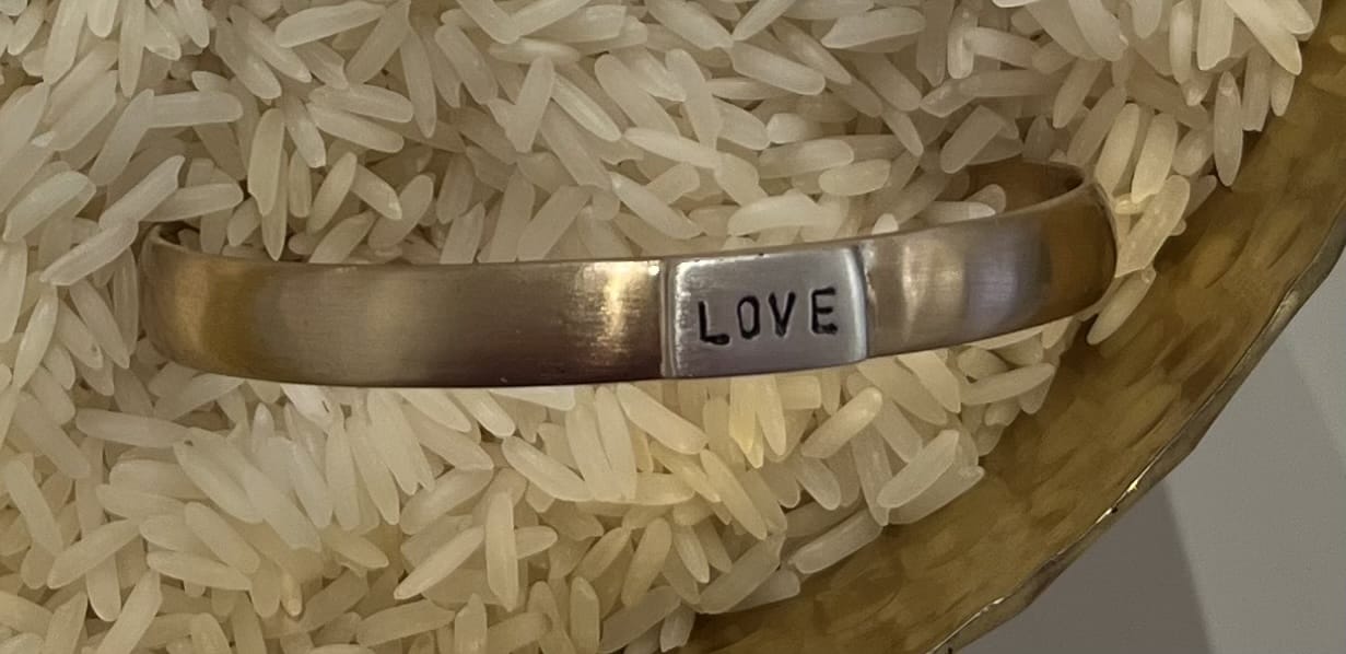Silver bracelet with 'LOVE' engraving