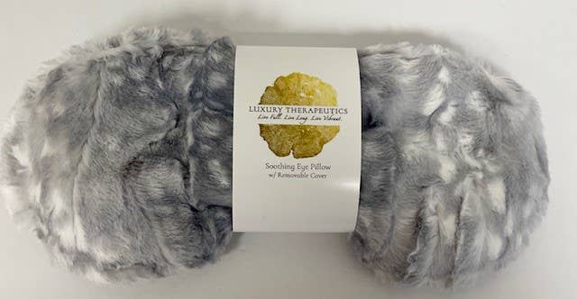 Close-up of faux fur eye pillow showing soft texture and lavender filling.