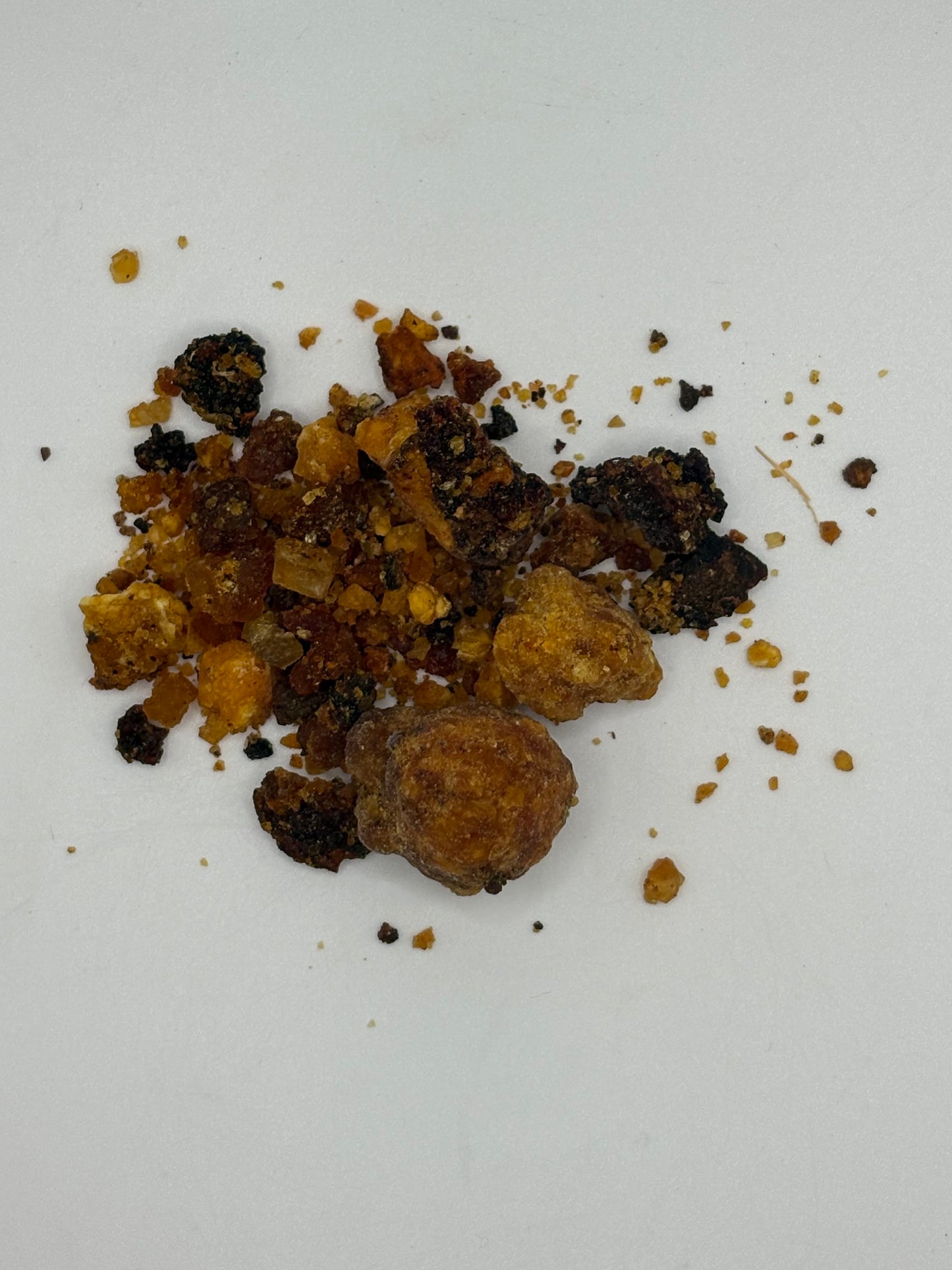 Close-up of sweet myrrh resin showing golden-brown texture.