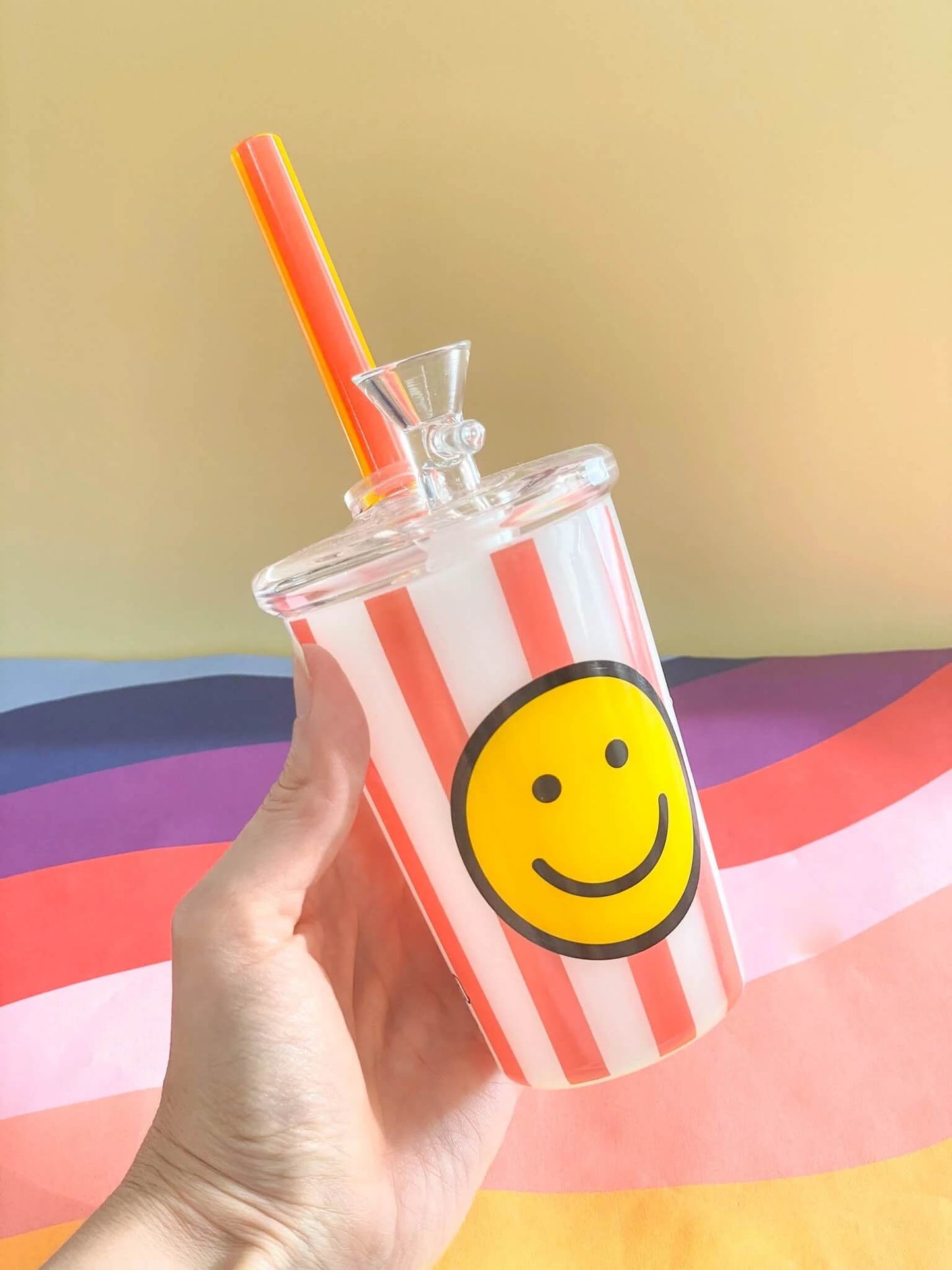 Smiley cup bong

Travel glass bong

On-the-go soda cup bong

Portable percolator bong

Cupholder-friendly bong

Smiley face bong pipe

Borosilicate travel bong

Straw mouthpiece bong

8 inch mini bong

CannaStyle portable bong