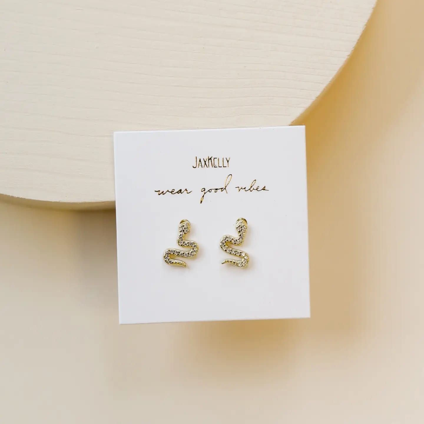 snake stud earrings, gold pavé earrings, CZ snake earrings, hypoallergenic gold studs, dainty gold earrings, serpent earrings, gold CZ studs