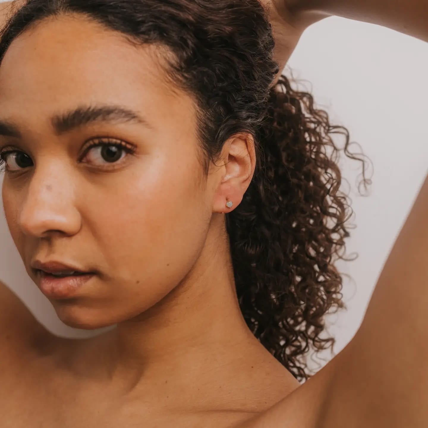 gemstone huggies, gold huggie earrings, amazonite huggies, amethyst huggies, rose quartz earrings, hypoallergenic gold earrings, stone huggie hoops