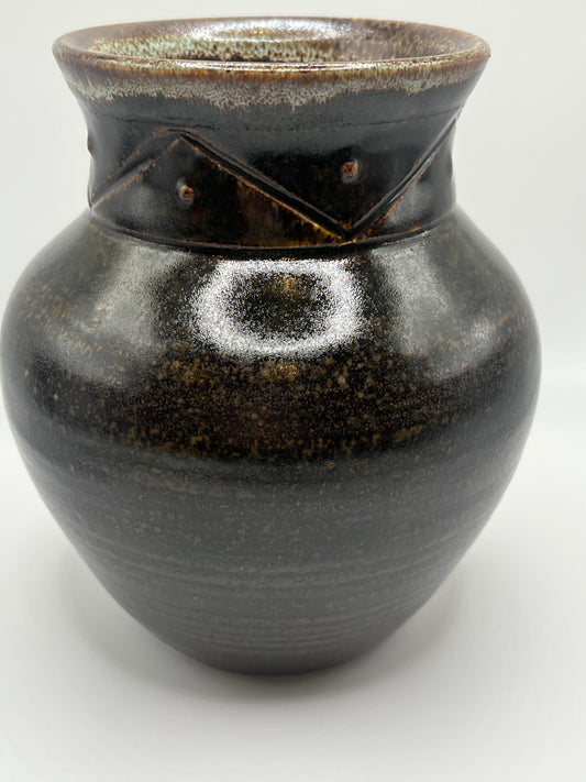 Hand-thrown black stoneware vase by artist Mike Teal. Elegant, functional, and richly detailed—crafted with care and tradition.