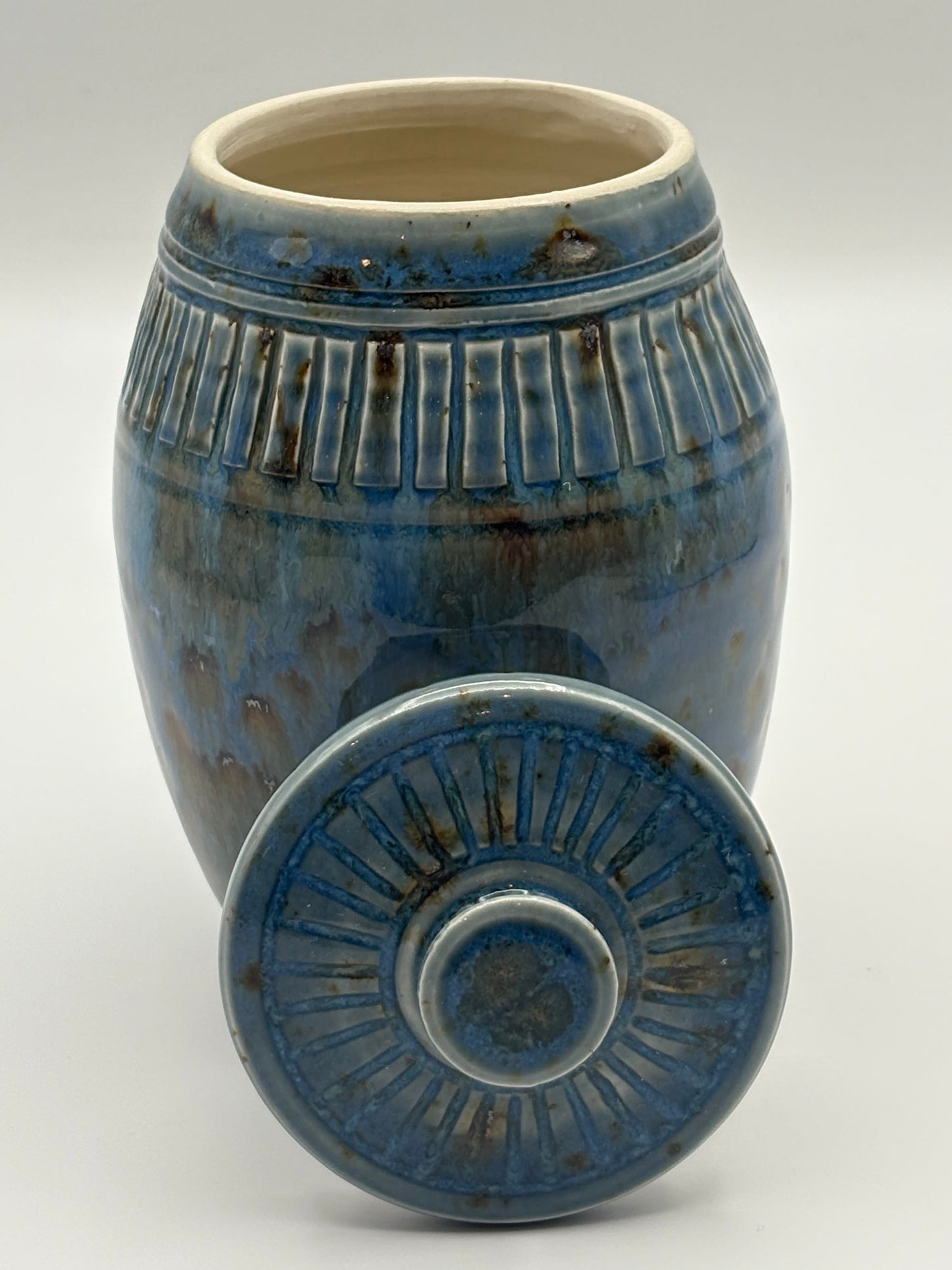 Blue ceramic jar with textured design