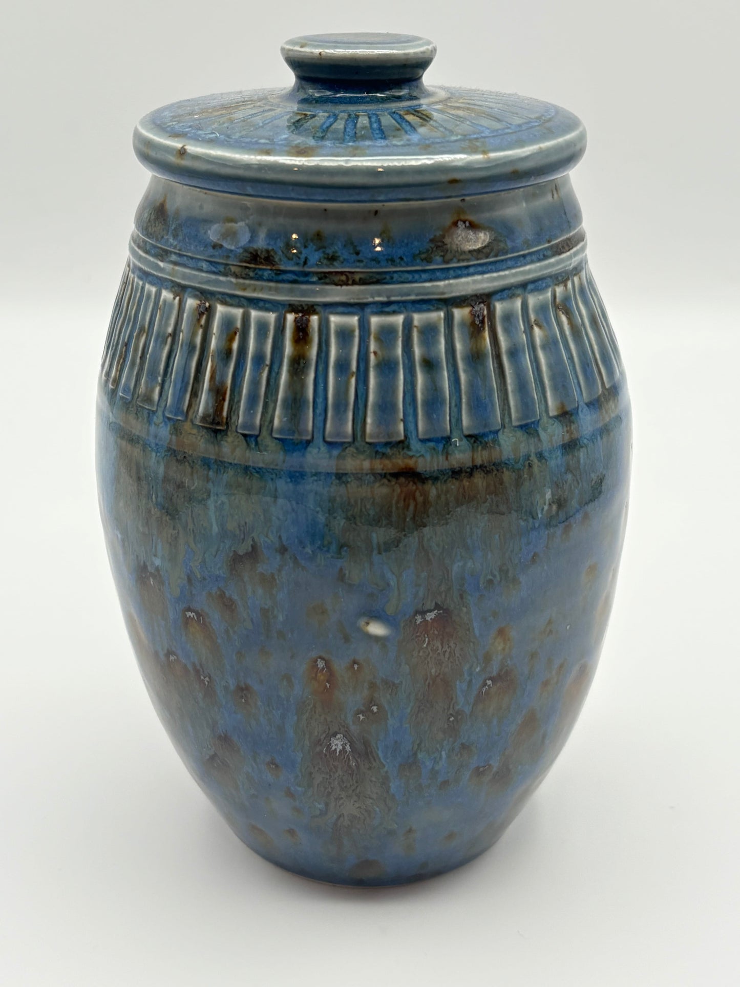 Blue ceramic jar with a lid 