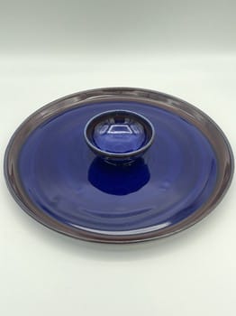 Mike Teal pottery, porcelain platter, handmade serving dish, blue red glaze, wheel-thrown ceramics, functional art, pottery bowl set, Tulsa ceramic artist, artisan serveware, YENology artisan collection
