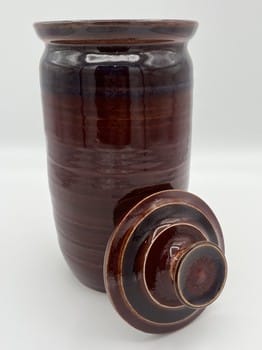 Mike Teal pottery, brick vase, porcelain lidded vase, handmade ceramics, artisan pottery, wheel-thrown porcelain, Tulsa ceramic artist, functional art, red ceramic vase, YENology artisan collection