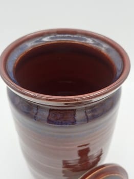 Mike Teal pottery, brick vase, porcelain lidded vase, handmade ceramics, artisan pottery, wheel-thrown porcelain, Tulsa ceramic artist, functional art, red ceramic vase, YENology artisan collection