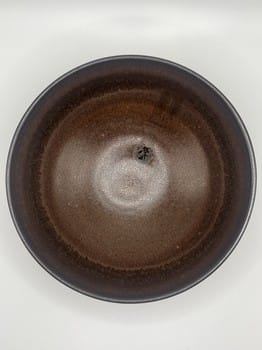 Mike Teal pottery, brown ceramic bowl, handmade pottery, artisan ceramics, wheel-thrown pottery, small stoneware bowl, Tulsa ceramic artist, functional art, minimalist pottery, YENology artisan collection