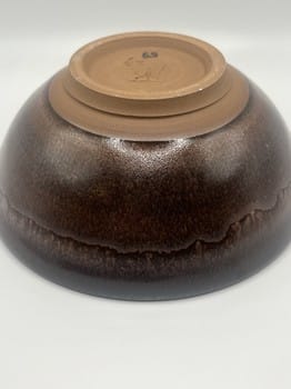 Mike Teal pottery, brown ceramic bowl, handmade pottery, artisan ceramics, wheel-thrown pottery, small stoneware bowl, Tulsa ceramic artist, functional art, minimalist pottery, YENology artisan collection