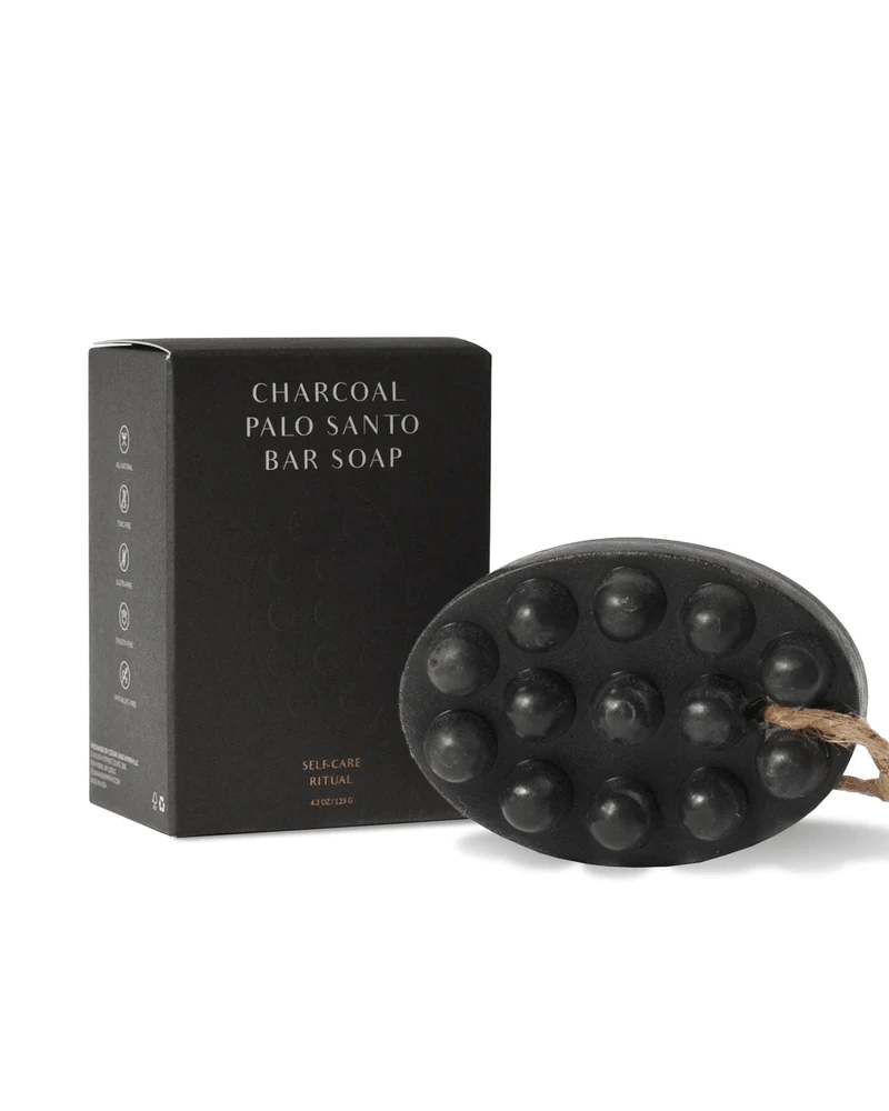 Black Charcoal Palo Santo Bar Soap with packaging on a white background