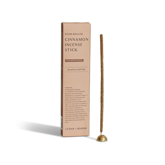 Hand-rolled Cinnamon Incense Sticks from Peru displayed on natural linen.