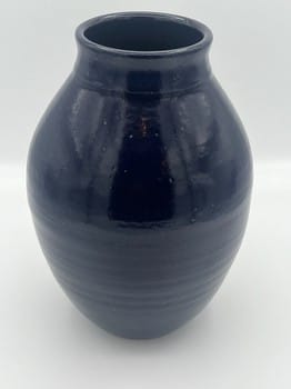 Cobalt blue ceramic vase
Mike Teal pottery
Hand-thrown stoneware vase
Cone 6 blue glaze vase
Tall wheel-thrown vase
Functional artisan pottery