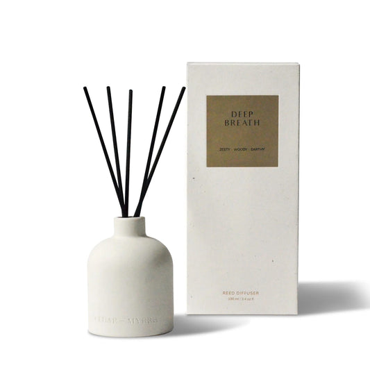 Deep Breath Reed Diffuser packaging box beside bottle and reeds.