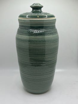 Green detailed pottery jar
10-inch artisan vase with lid
Handmade Tulsa ceramic art
Food-safe ceramic storage