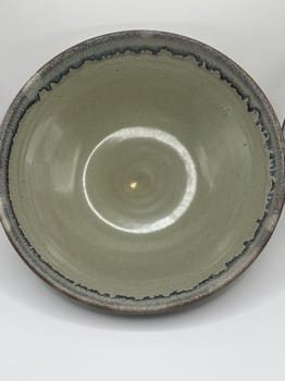 Grey ceramic bowl
Blue and red accent pottery
Mike Teal handmade bowl