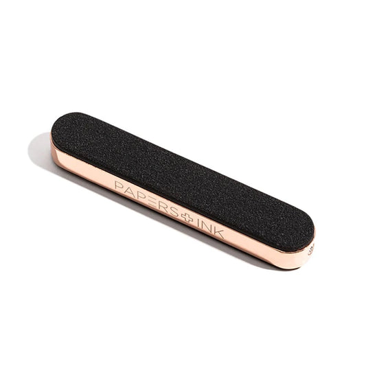 Black and rose gold usb lighter with 'Papers & Ink' branding on a white background