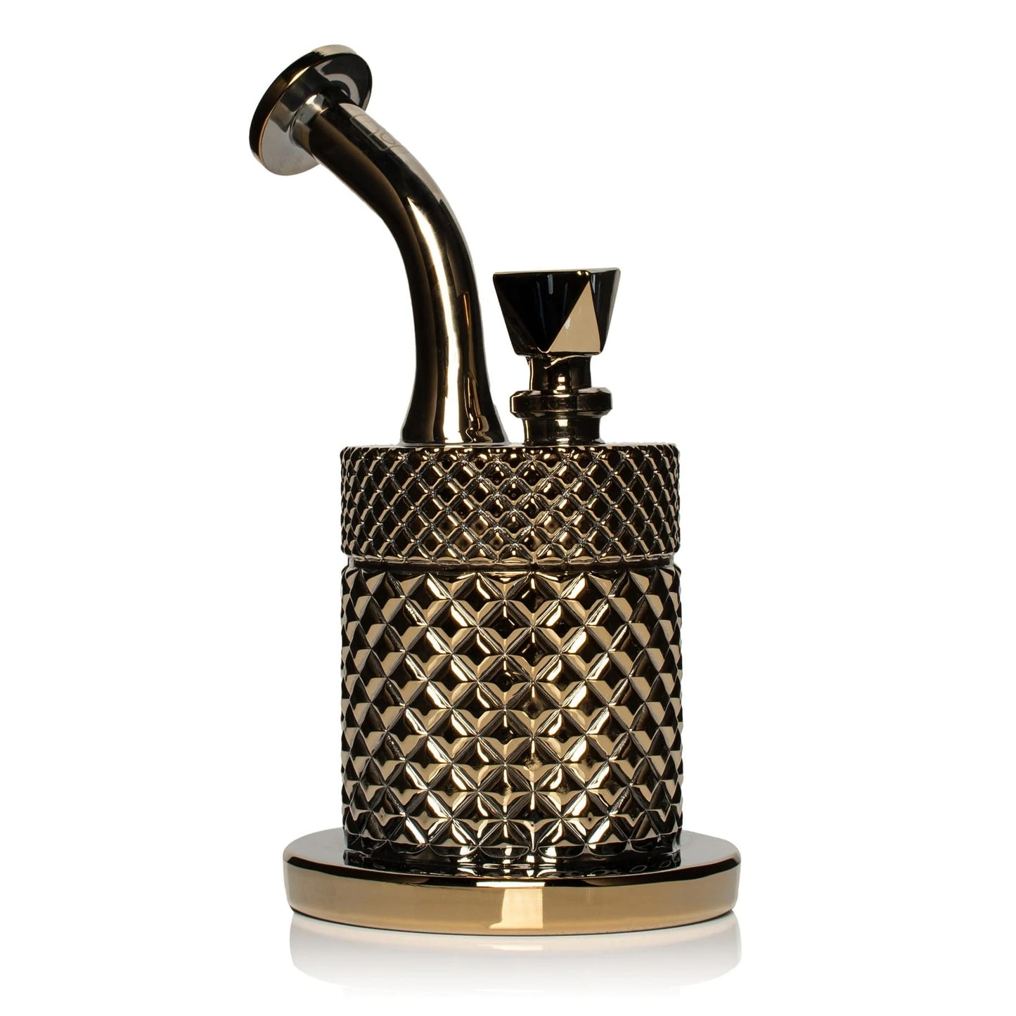 Gold-colored smoking accessory with intricate design on a white background