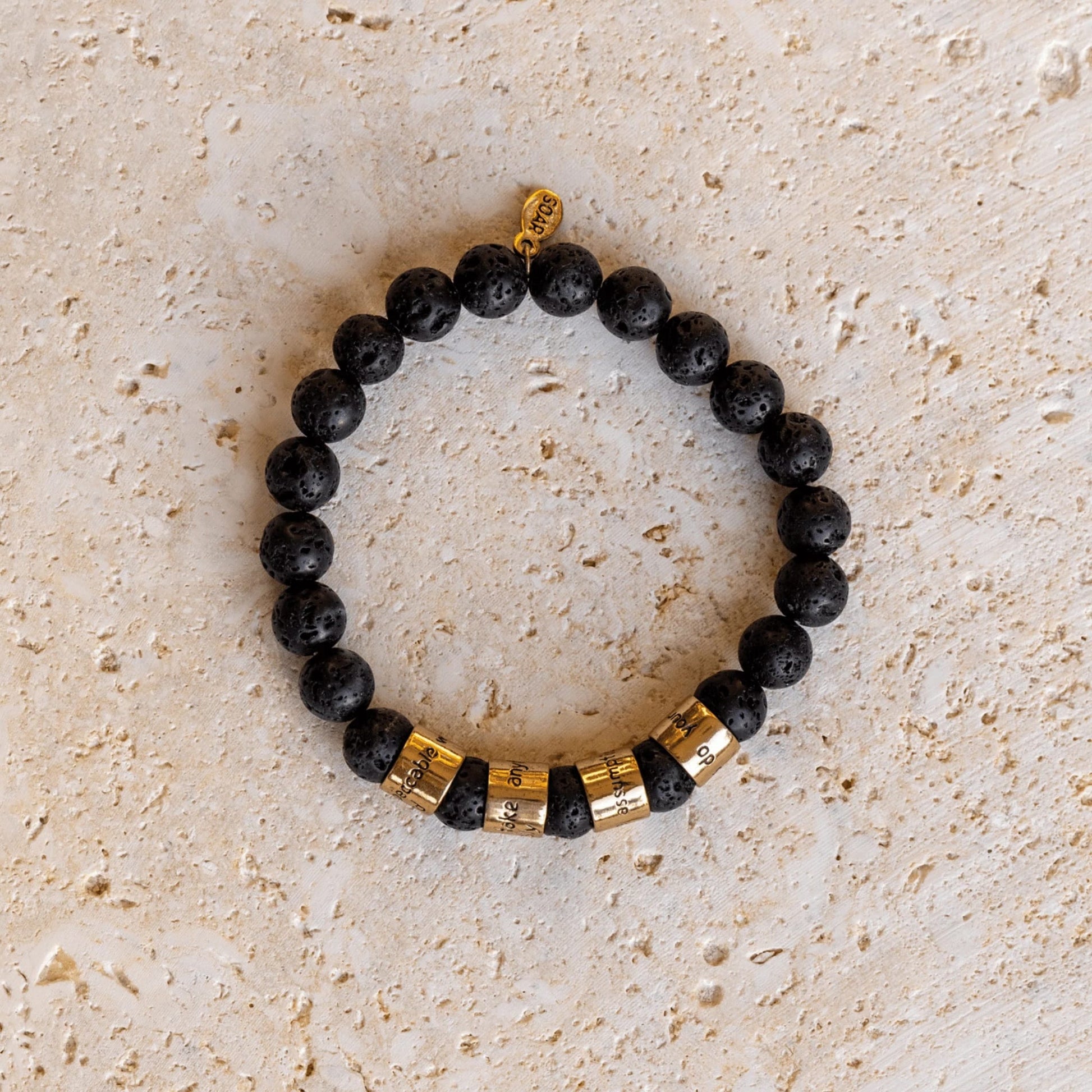 Four Agreements bracelet, black lava bracelet, grounding jewelry, Jewelry Evolution, don Miguel Ruiz bracelet, Toltec wisdom jewelry, lava rock beads, unisex gemstone bracelet, mindfulness jewelry, YENology accessories