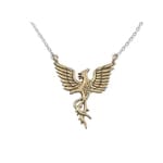 Gold phoenix necklace on a white background