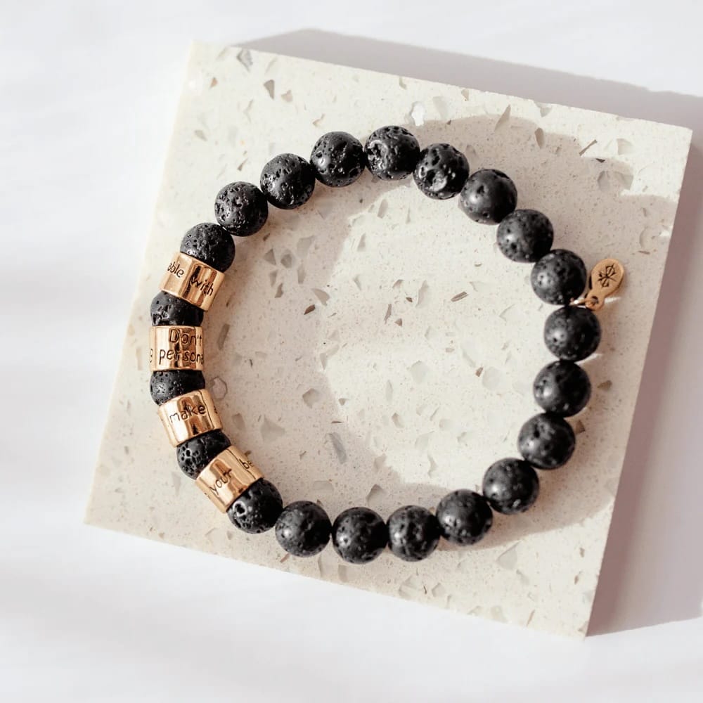 Four Agreements bracelet, black lava bracelet, grounding jewelry, Jewelry Evolution, don Miguel Ruiz bracelet, Toltec wisdom jewelry, lava rock beads, unisex gemstone bracelet, mindfulness jewelry, YENology accessories