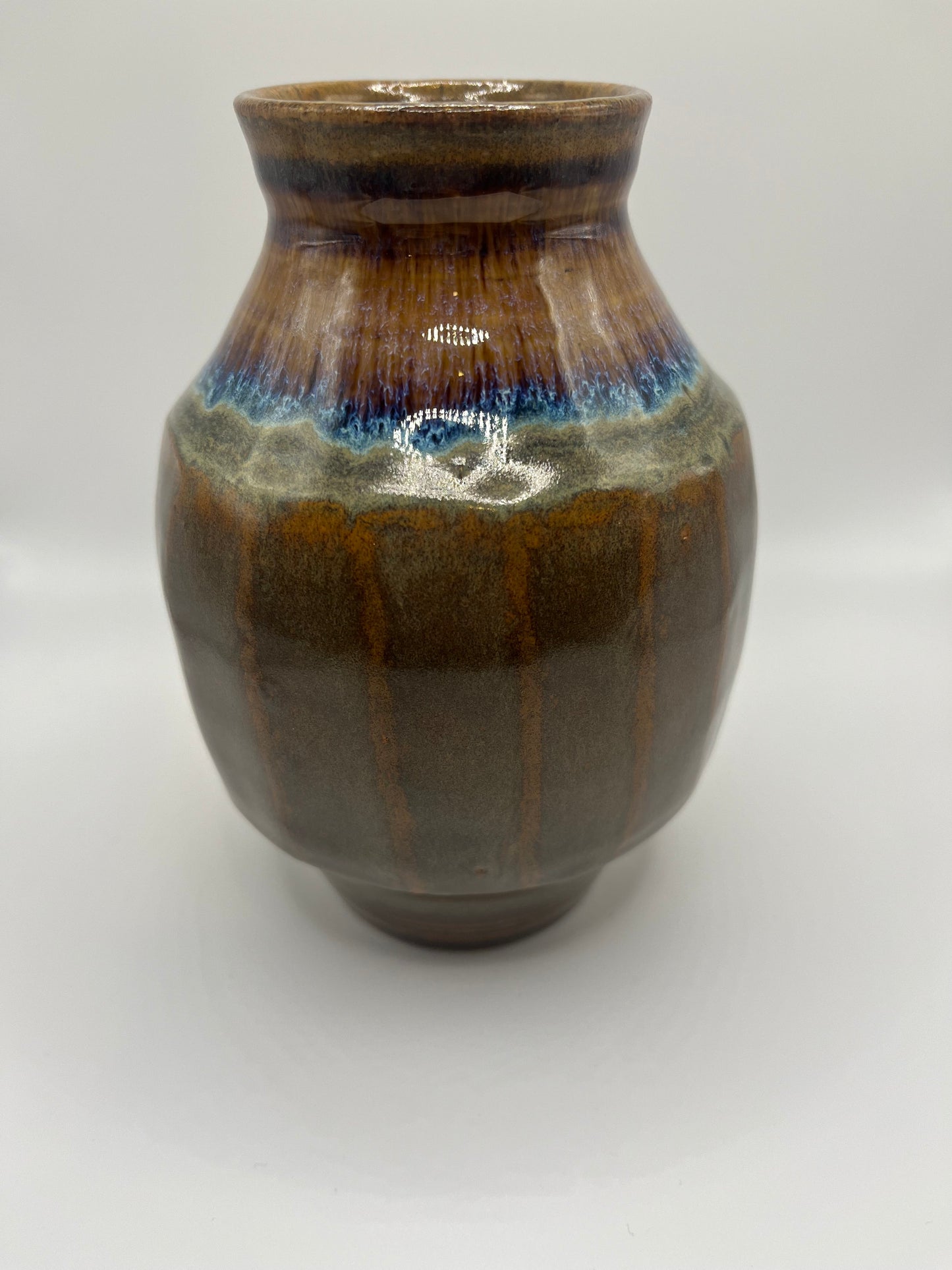 Multi-colored small vase

Mike Teal pottery

Hand-thrown ceramic vase

Cone 6 stoneware art

5.5” colorful pottery vase

Handmade decorative vessel

Tulsa studio ceramics

Functional ceramic home decor

Artisan small flower vase

Wheel-thrown pottery art