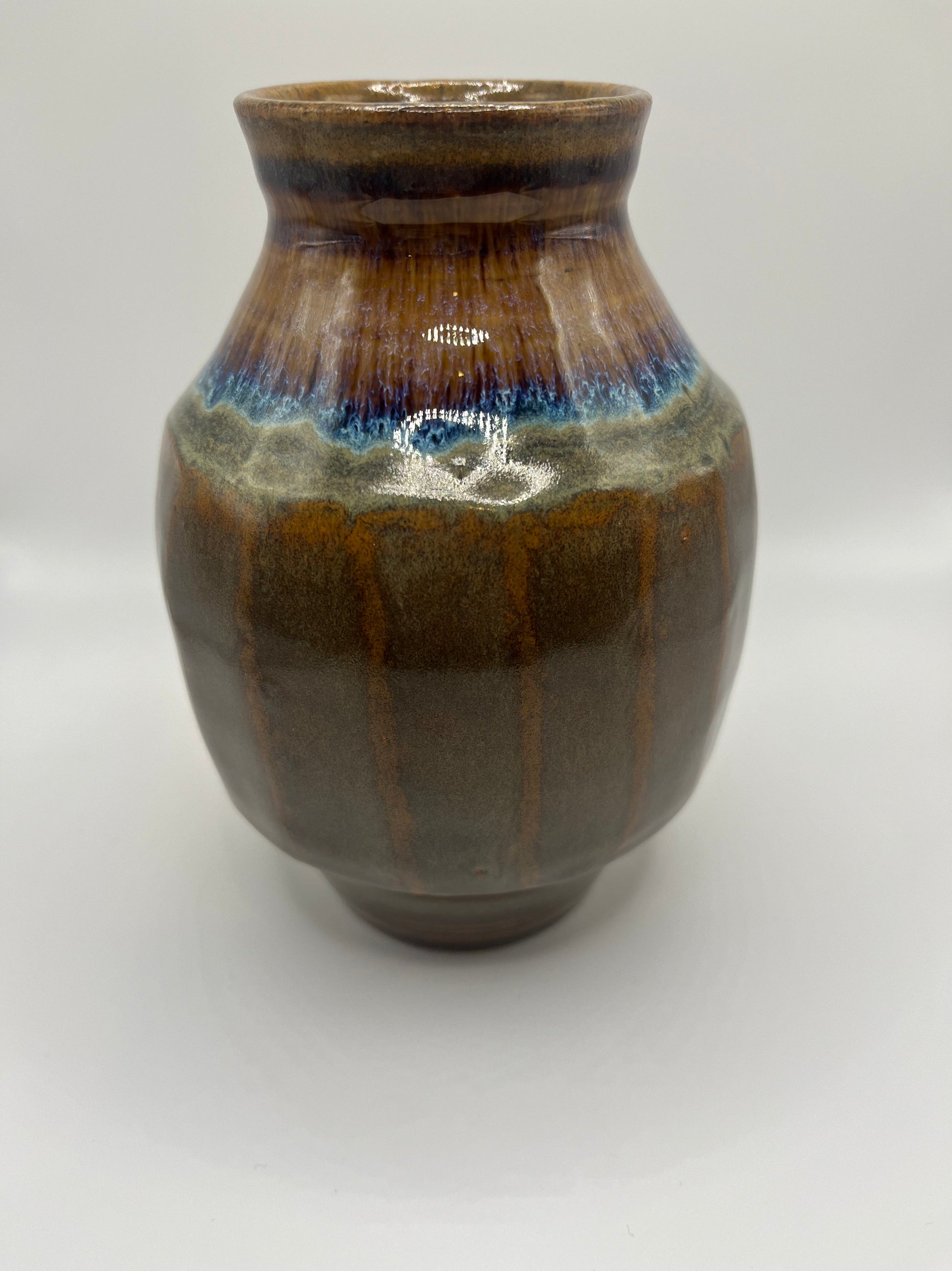 Multi-colored small vase

Mike Teal pottery

Hand-thrown ceramic vase

Cone 6 stoneware art

5.5” colorful pottery vase

Handmade decorative vessel

Tulsa studio ceramics

Functional ceramic home decor

Artisan small flower vase

Wheel-thrown pottery art