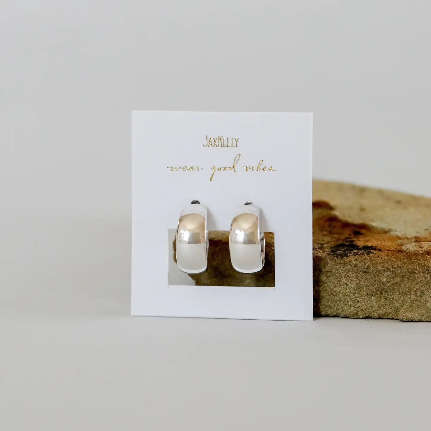 silver hoop earrings, wide silver hoops, rhodium plated earrings, hypoallergenic hoops, modern silver earrings, small silver hoops, tarnish resistant earrings