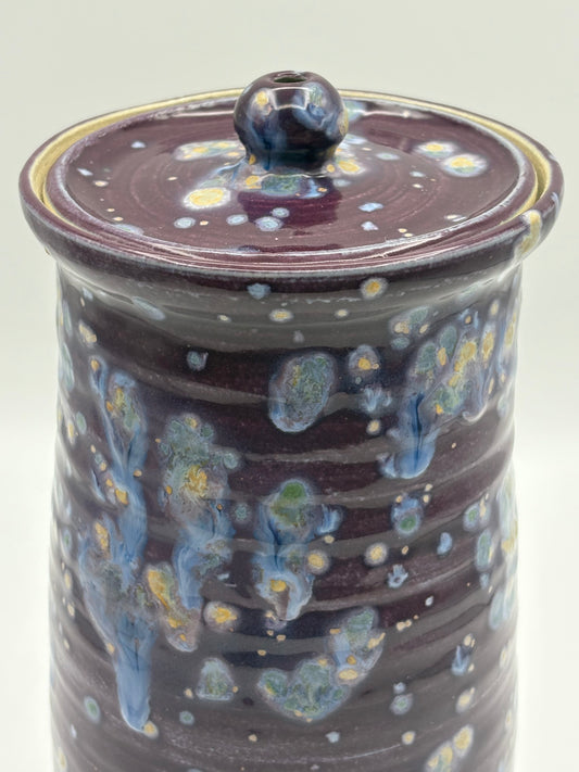 Ceramic jar with a starry night design
