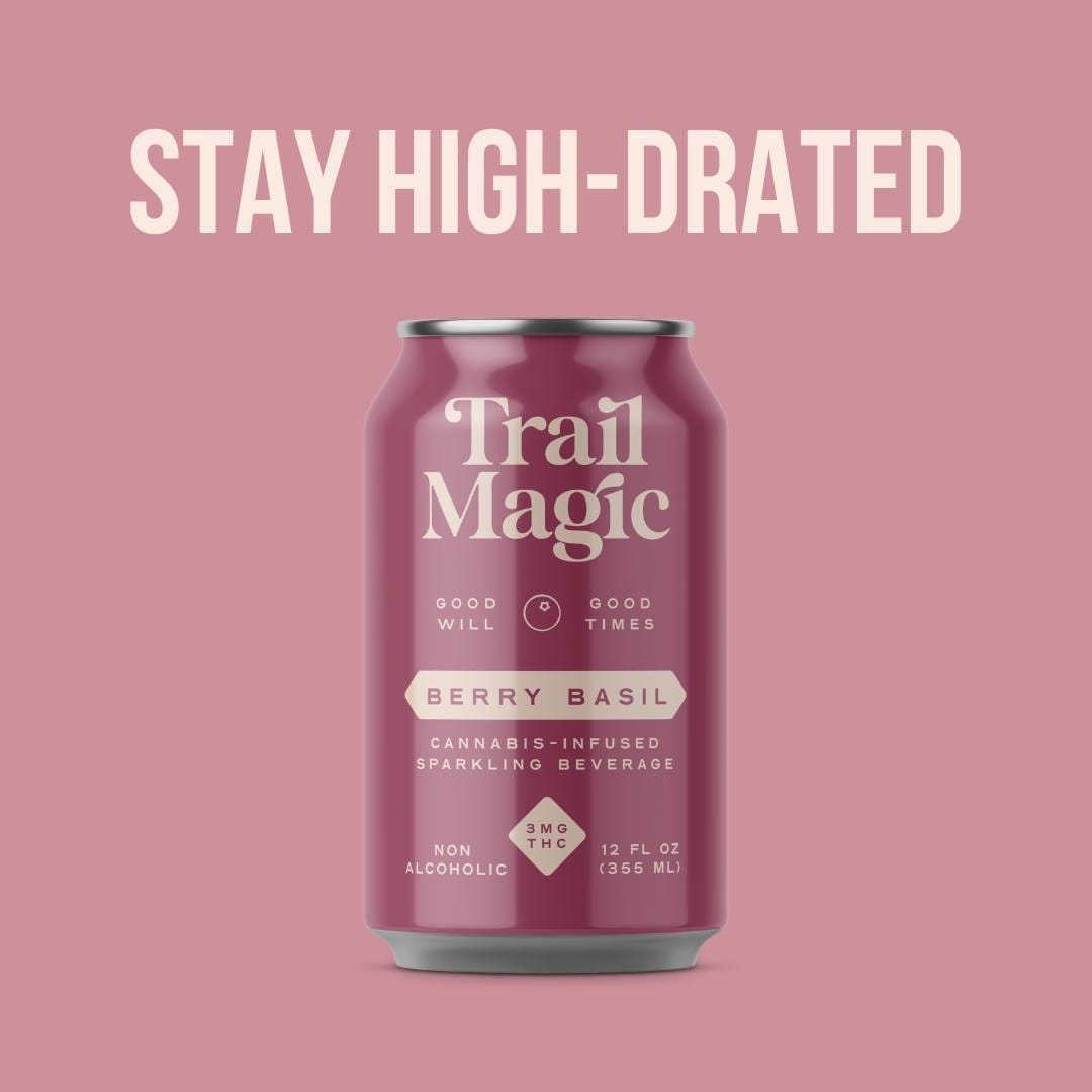 Trail Magic berry basil cannabis-infused sparkling beverage can on a pink background with text 'Stay High-Drated'.